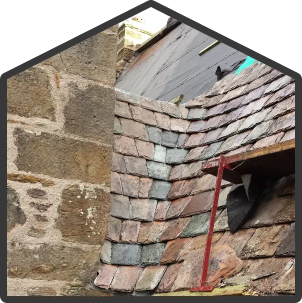 house shaped image of a roof with brown tiles under construction